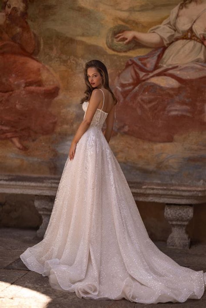 Unveiling The Enchanting Tapestry Of Lidia Curanaj's Wedding
